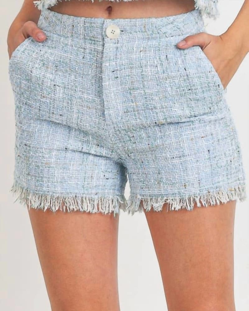 Front of a model wearing a size Large Tweed Raw Hem Short In Blue in Blue by paper crane. | dia_product_style_image_id:357092